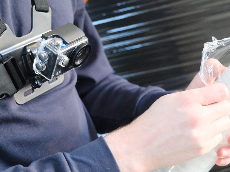 Mover wearing GoPro bodycam on chest harness